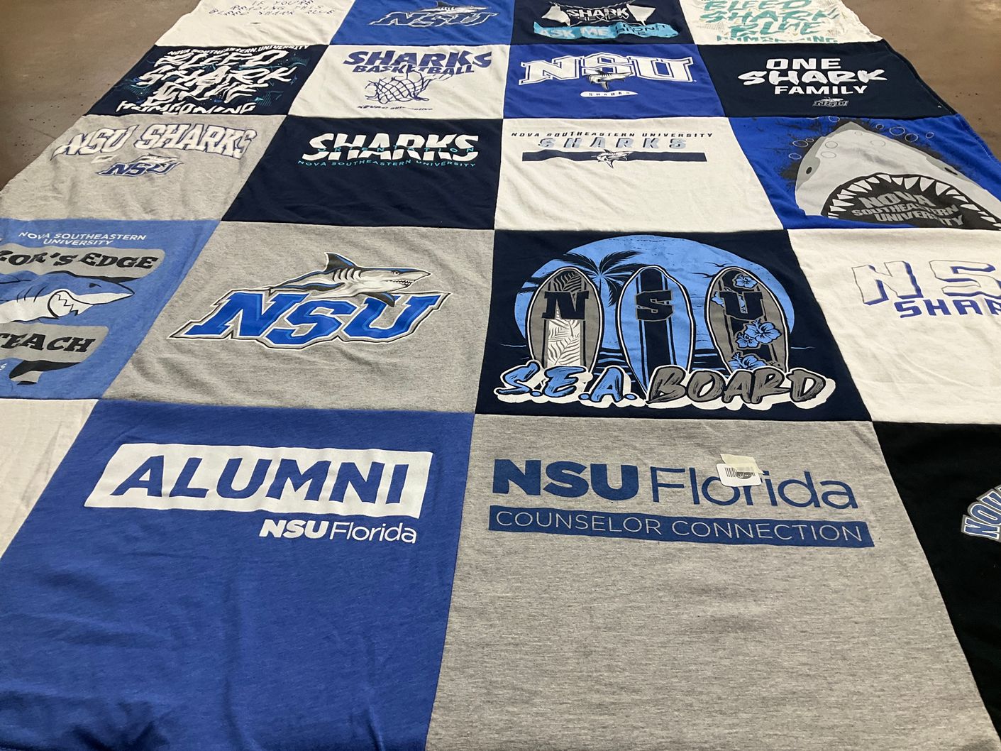 T-shirt quilt featuring nova southeastern university sharks by Chris from PA