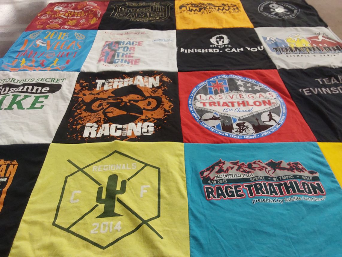 T-shirt quilt with triathlon, endurance sports themes by Suzanne from NV