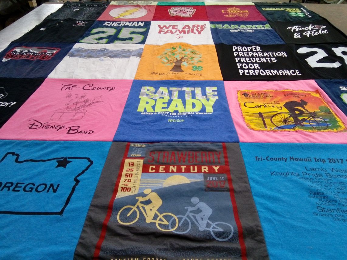 T-shirt quilt with music, cycling themes by Suzanne from OR
