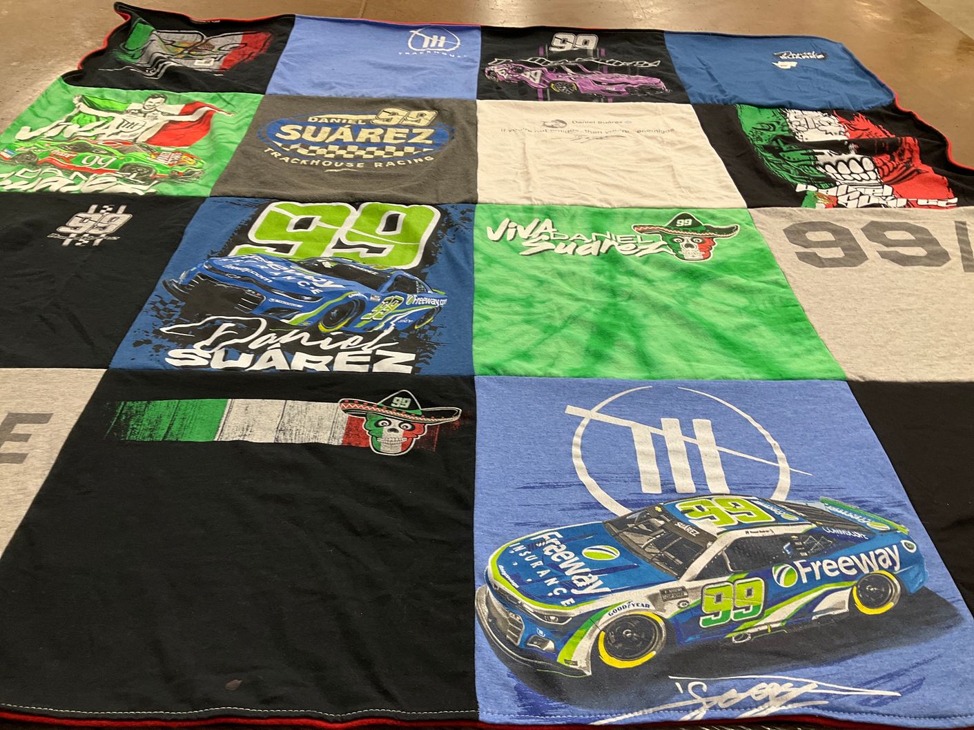T-shirt quilt with nascar, auto racing themes by Karen from CO
