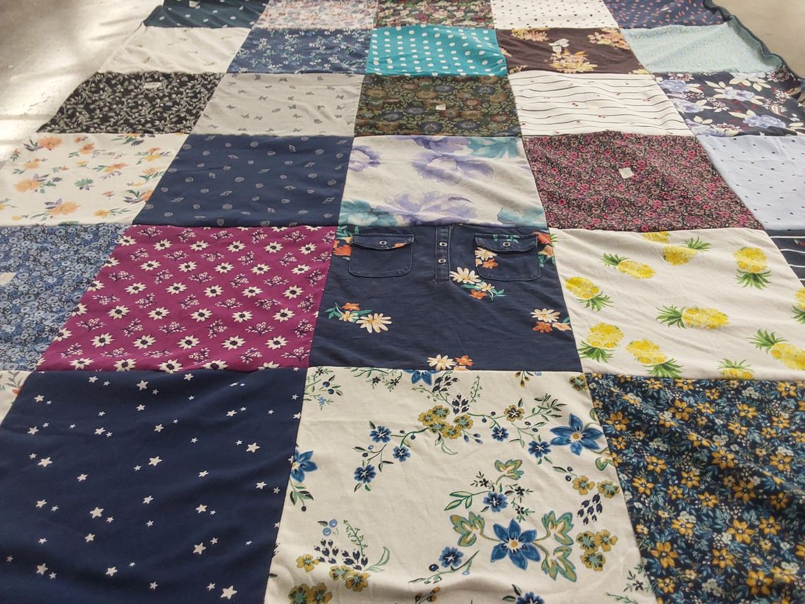 T-shirt quilt with quilting, textiles themes by Jennifer from CA