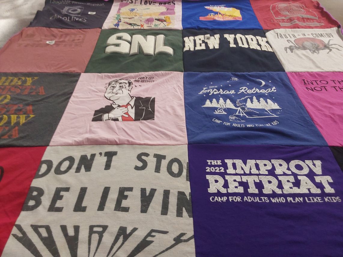 T-shirt quilt with improv, comedy themes by Winn from TX