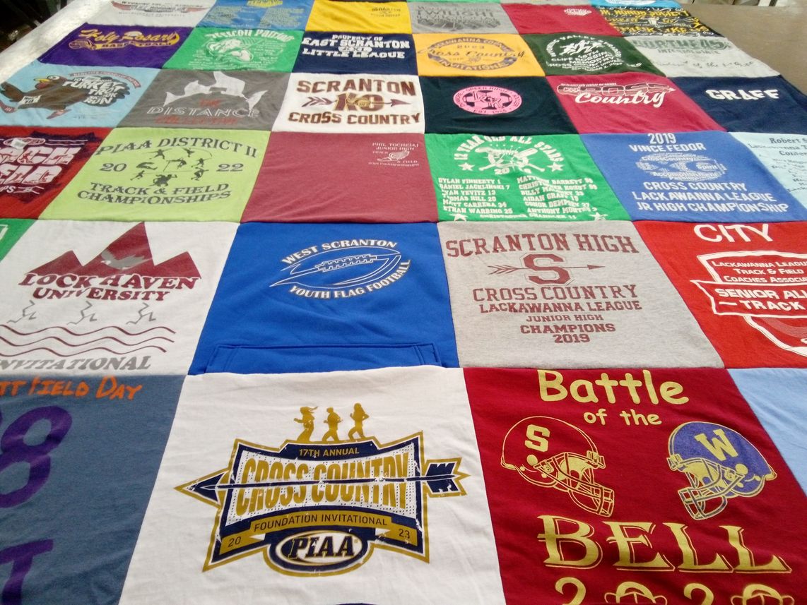 T-shirt quilt featuring west scranton youth flag football, scranton high cross country by Amy from PA