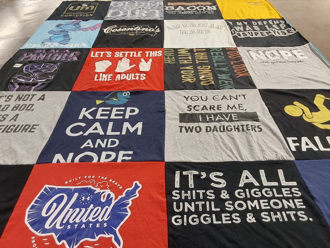 T-shirt quilt with humor, pop culture themes by shoni from MO