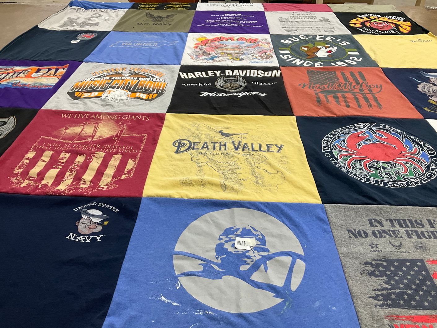 T-shirt quilt with military, music themes by Sam from FL