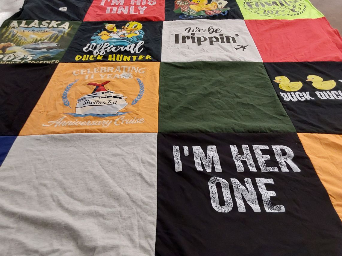 T-shirt quilt with travel, family reunions themes by PO from NC
