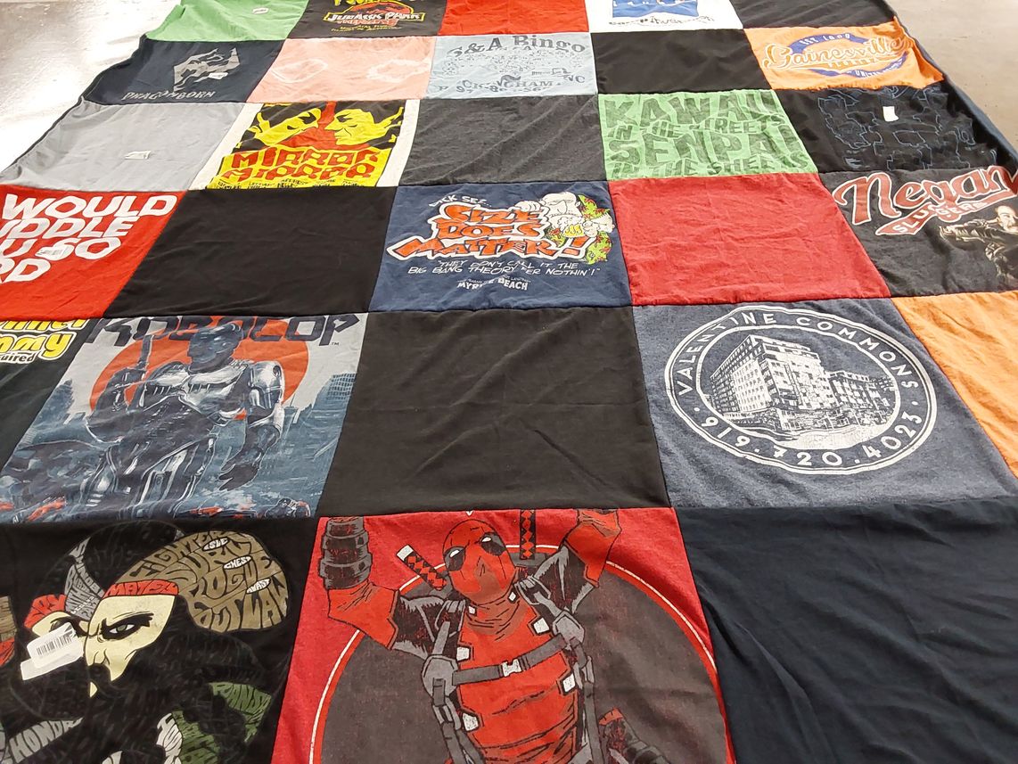 T-shirt quilt with comics, movies themes by PO from NC