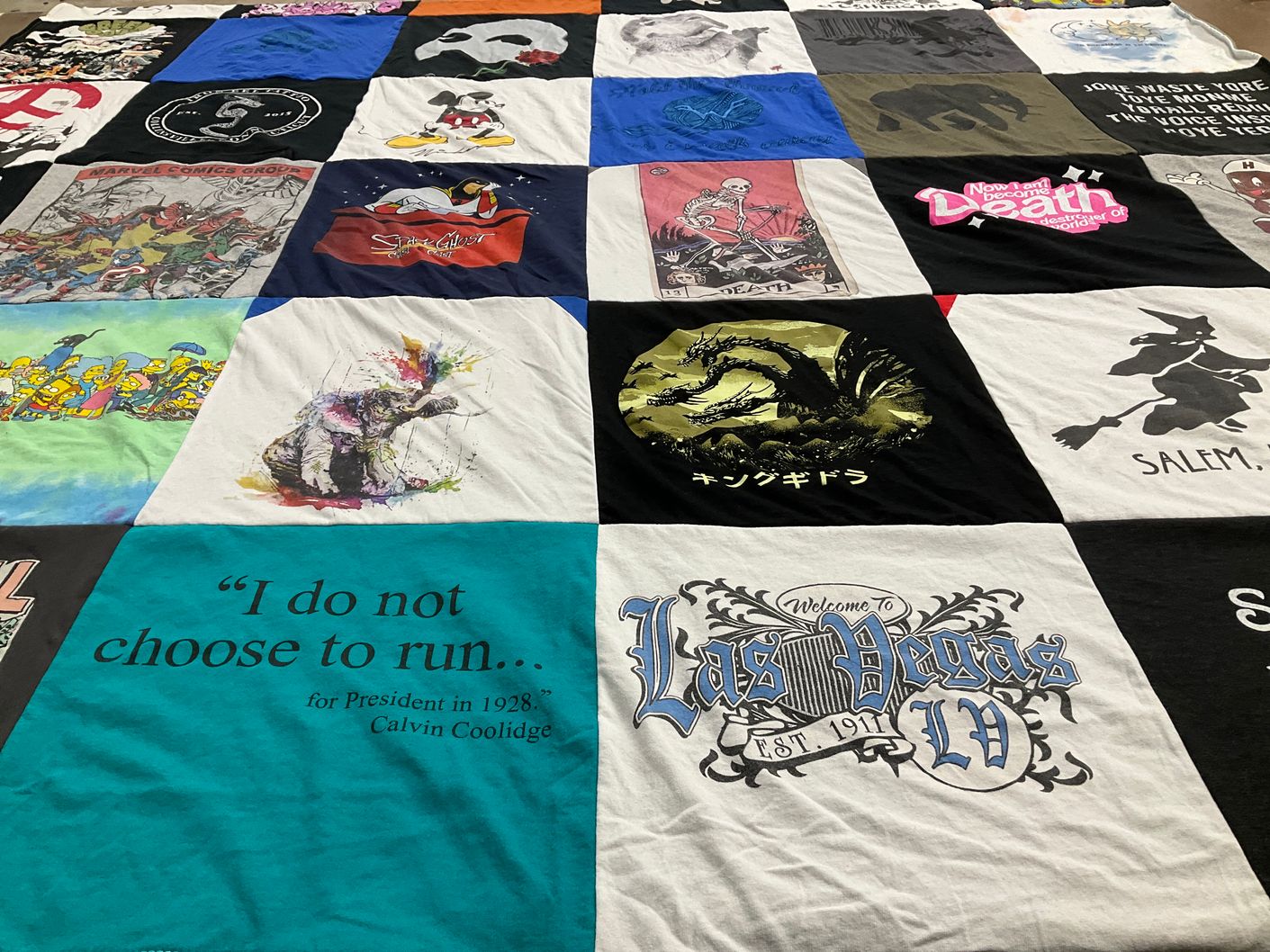 T-shirt quilt with comics, movies themes by Patrick from CT