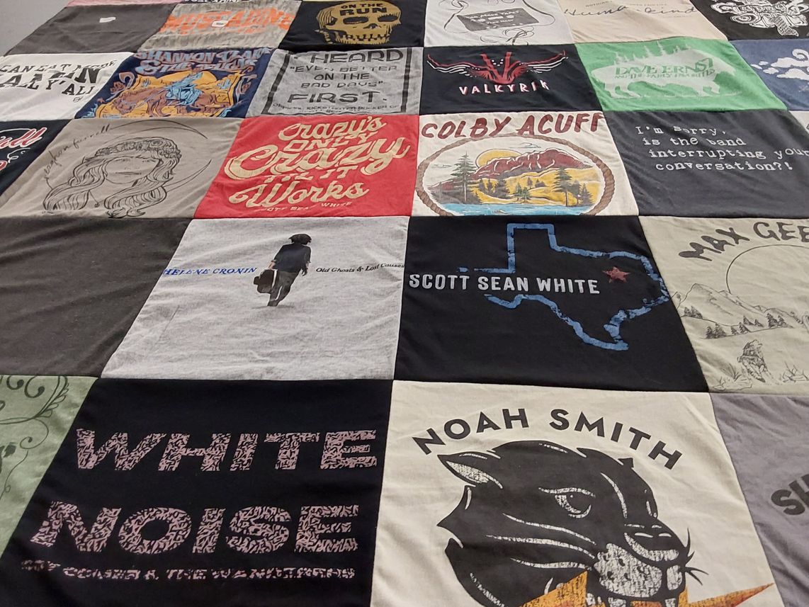 T-shirt quilt with art, music themes by Shellie from OH