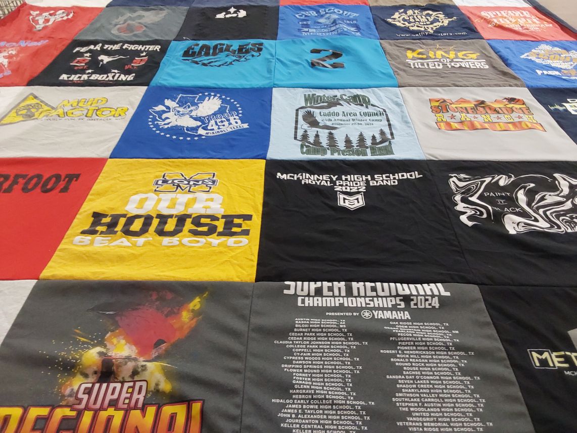 T-shirt quilt from mckinney high school by Kathie from TX