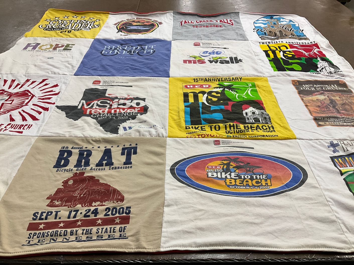 T-shirt quilt with biking, charity themes by joyce from TX