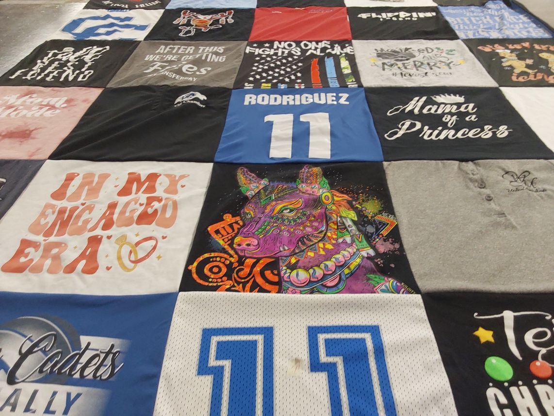 T-shirt quilt with engagement, celebrations themes by Laura from TX