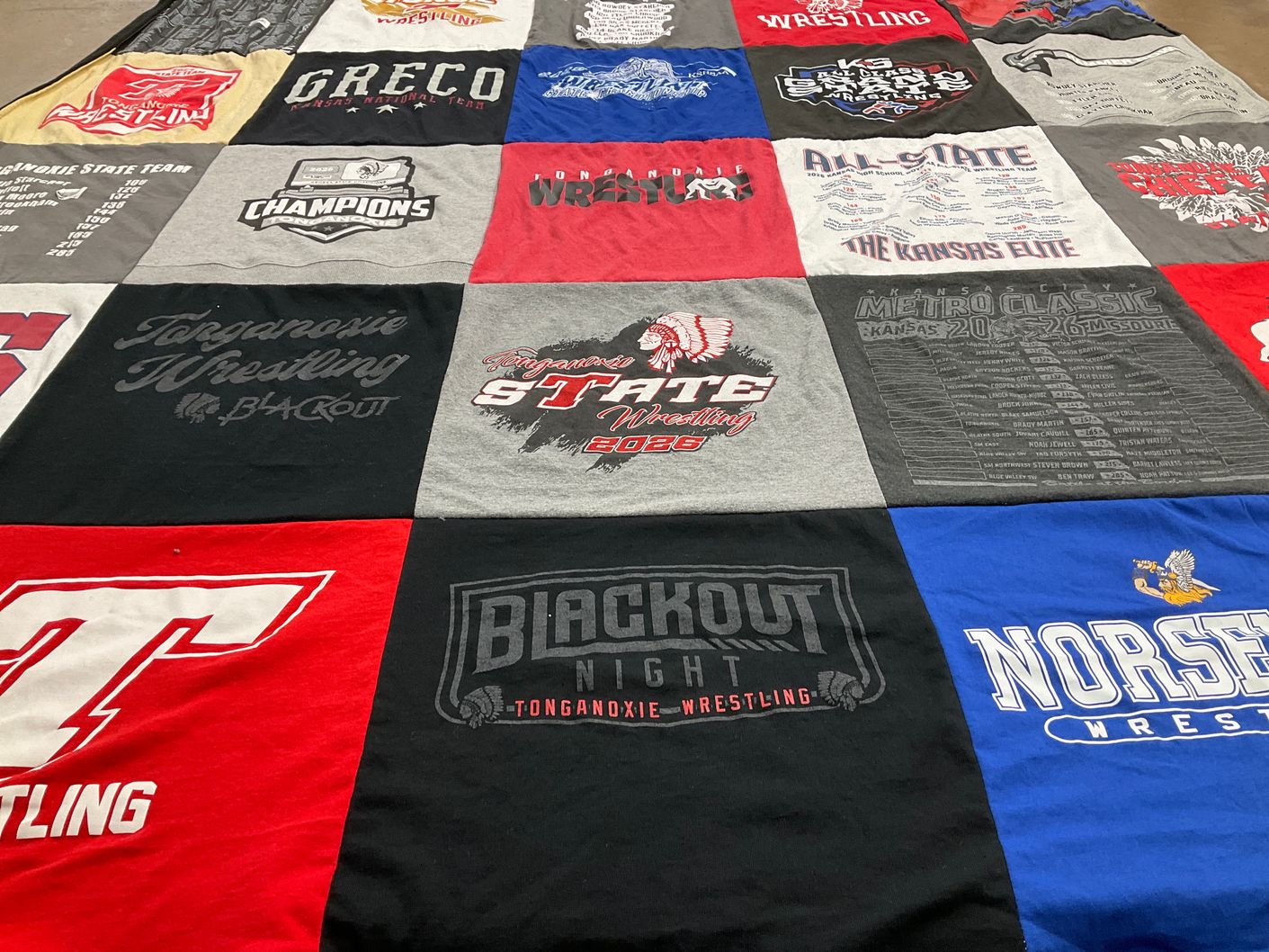T-shirt quilt featuring tonganoe wrestling, norsemen wrestling by Michelle from KS