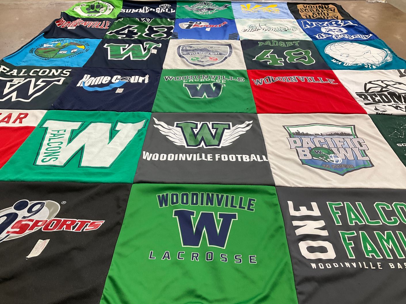 T-shirt quilt featuring woodinville high school falcons by Sheri from WA