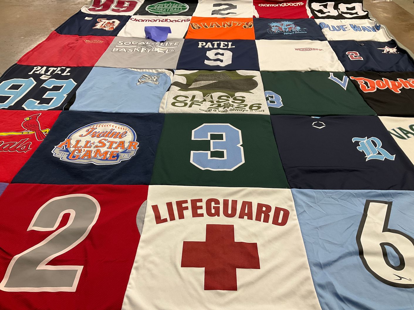 T-shirt quilt with basketball, baseball themes by Avani from CA