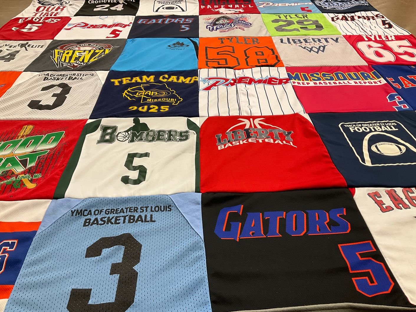 T-shirt quilt featuring gators, bombers by Leann from MO