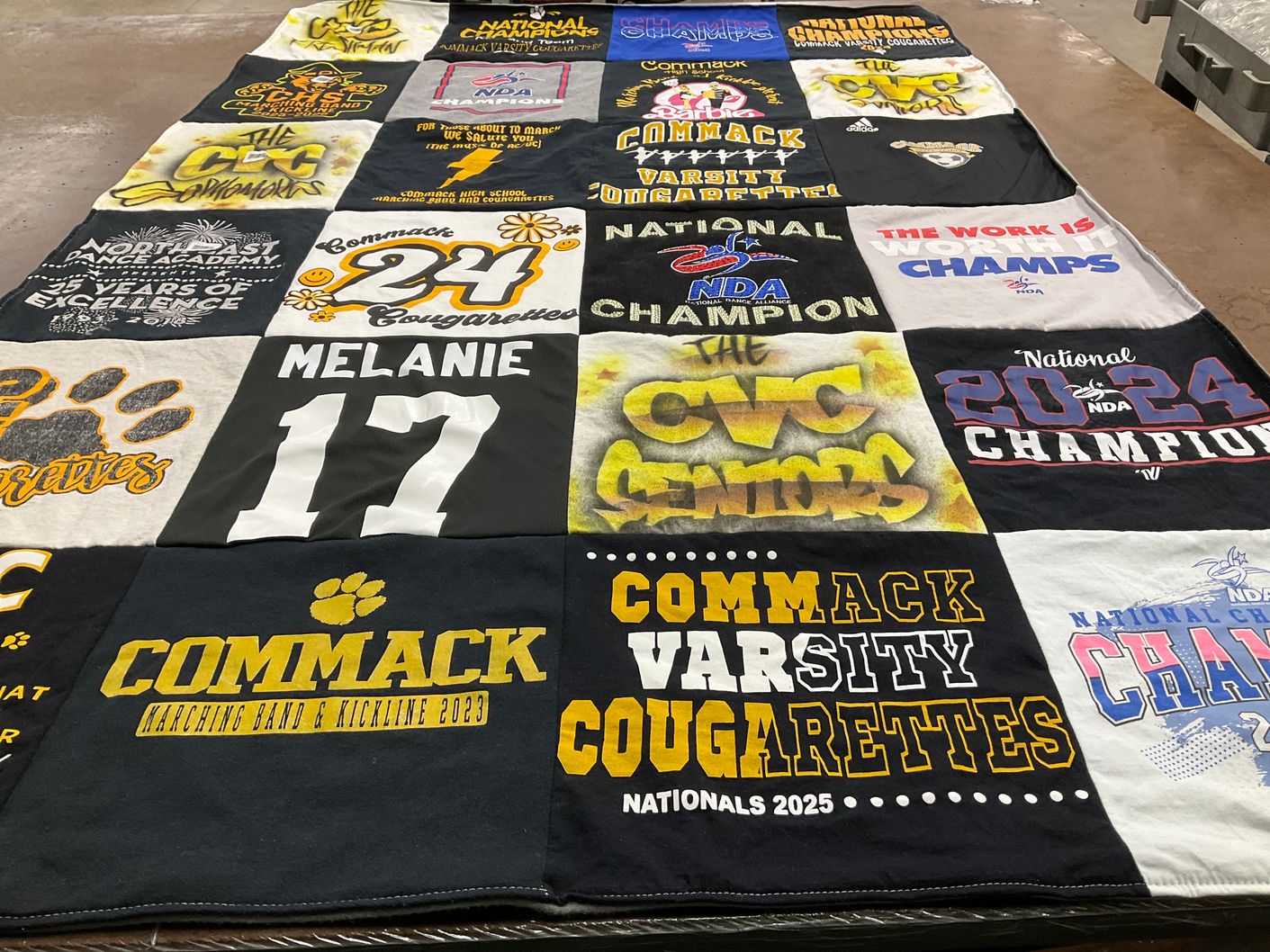 T-shirt quilt featuring commack varsity cougarettes by Lauri from NY