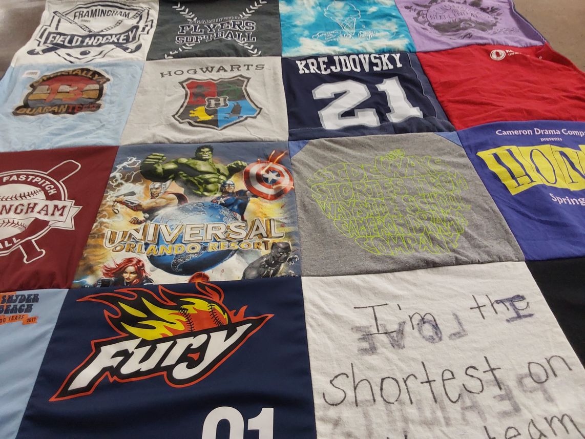 T-shirt quilt featuring framingham flyers by Jill from MA