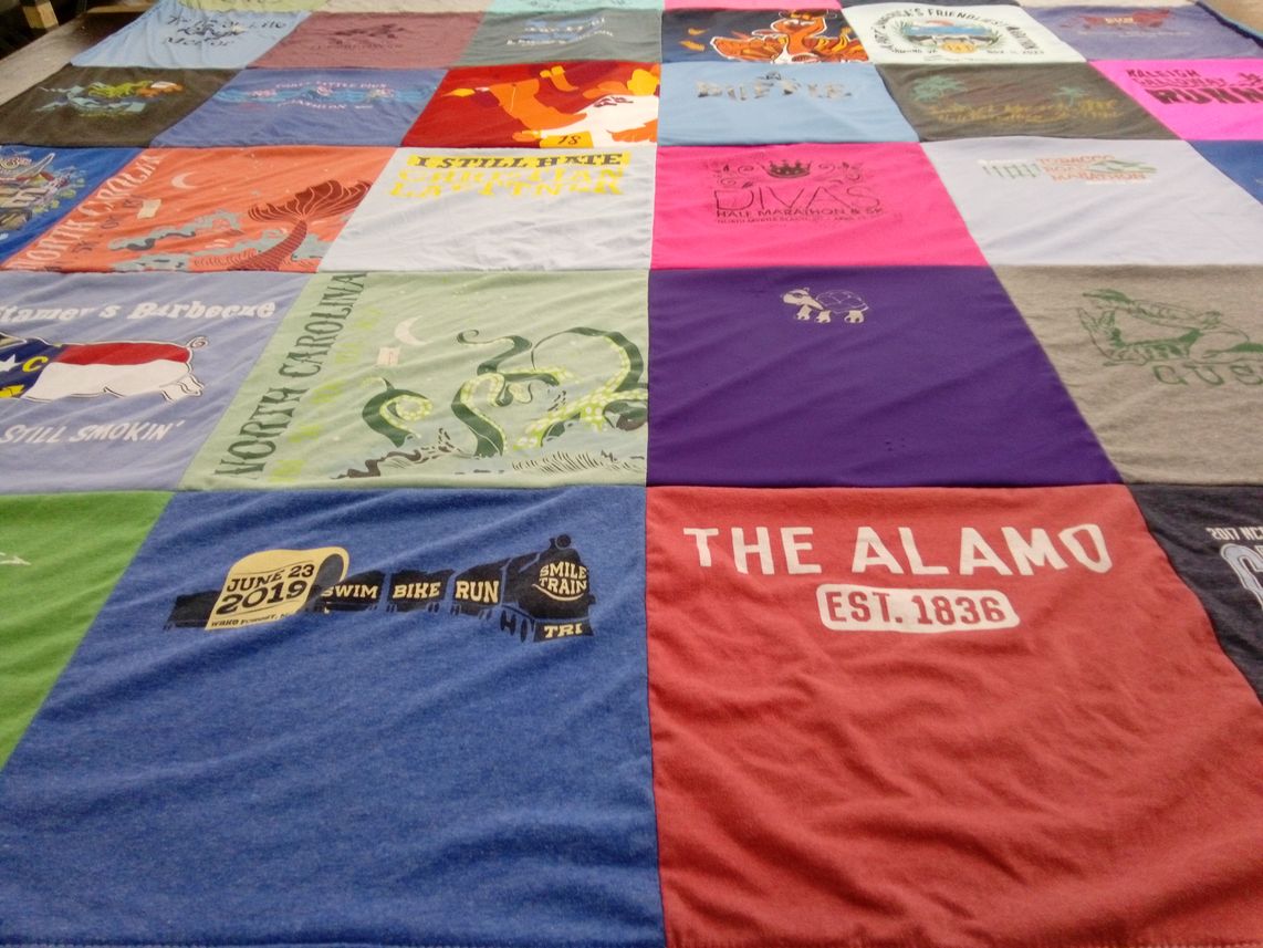 T-shirt quilt with swimming, biking themes by Buffie from NC