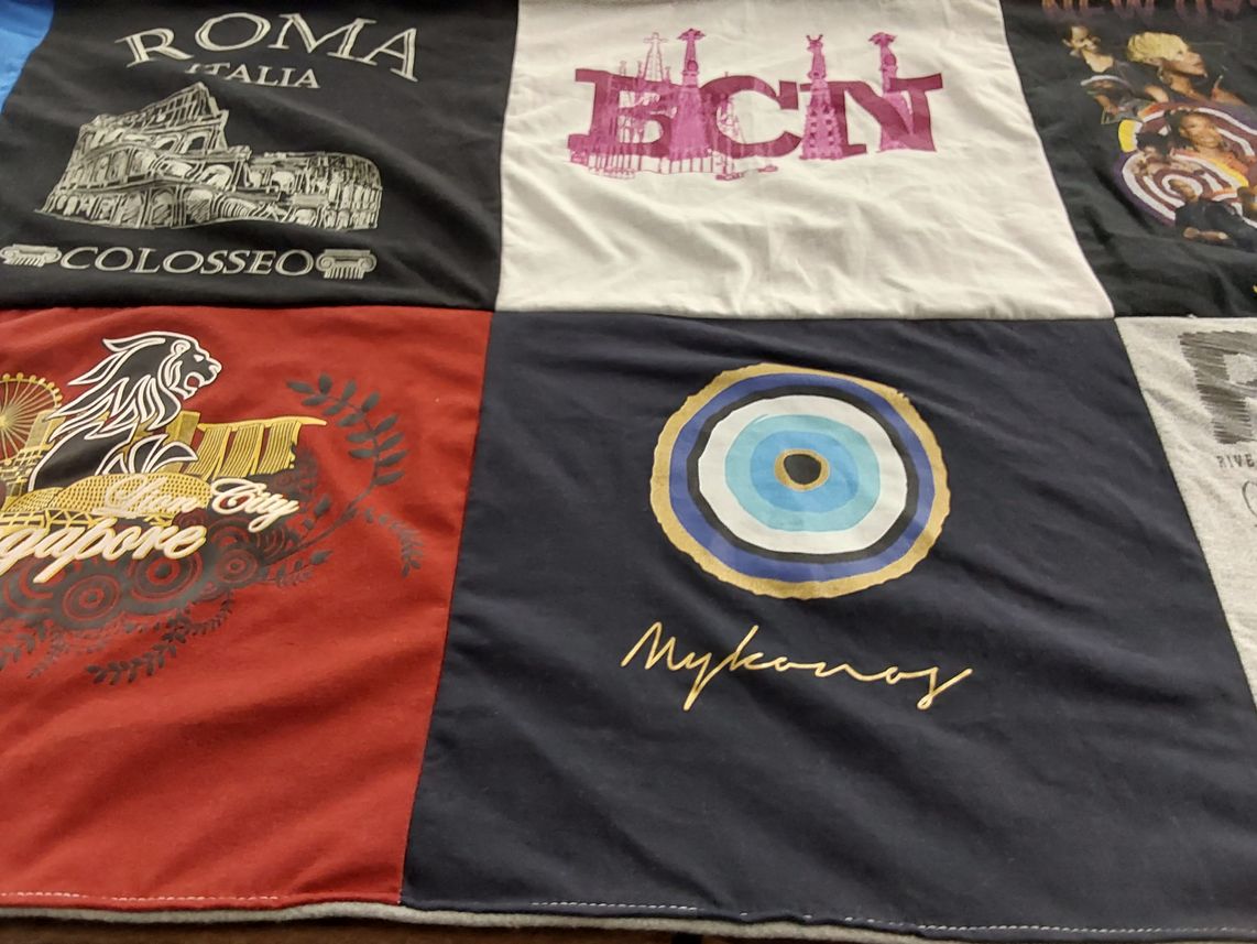 T-shirt quilt with travel, culture themes by Daphne from MI