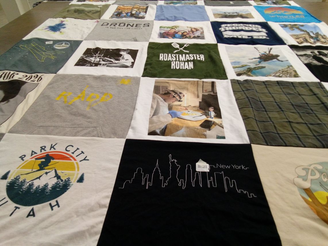 T-shirt quilt with snowboarding, music themes by Mo from CA