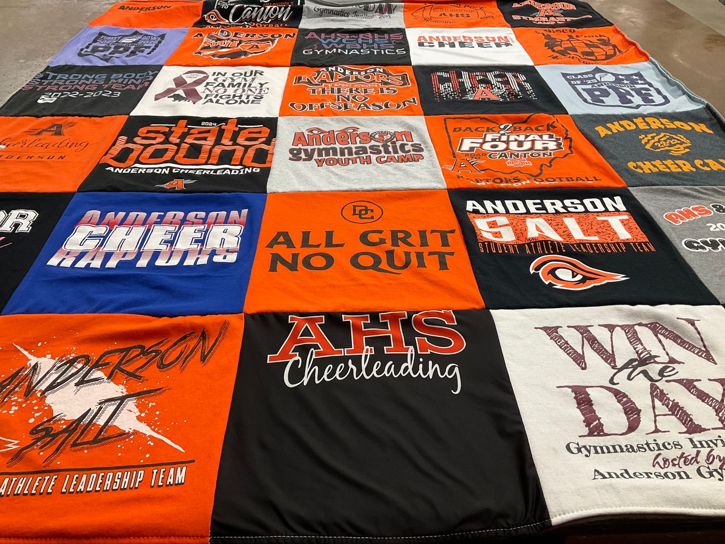 T-shirt quilt featuring anderson cheer raptors by Angela from OH