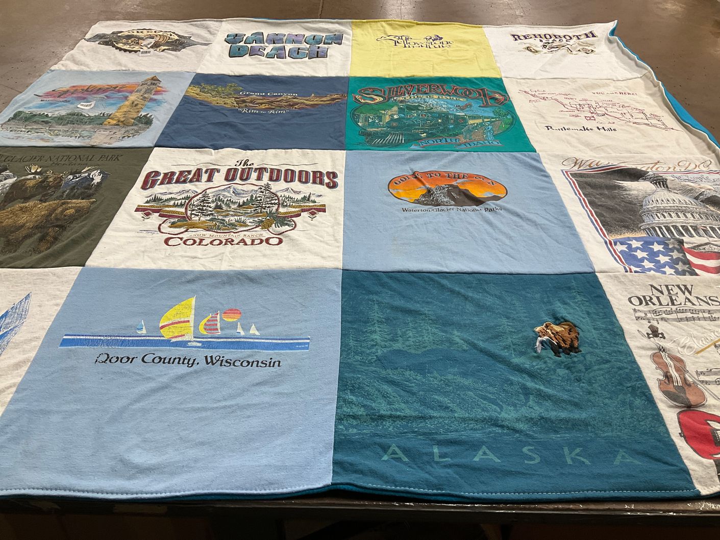 T-shirt quilt with travel, outdoors themes by Dennis from WA