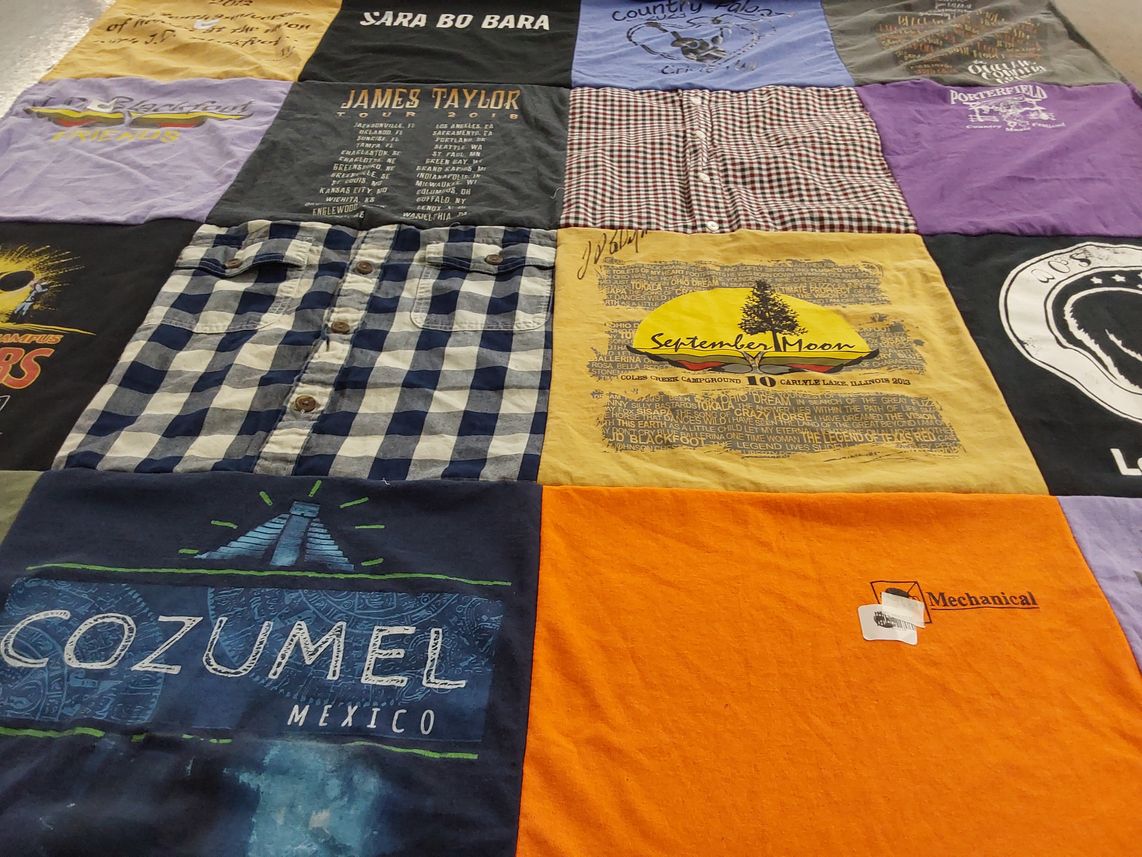 T-shirt quilt with music, travel themes by Kimberly from IL