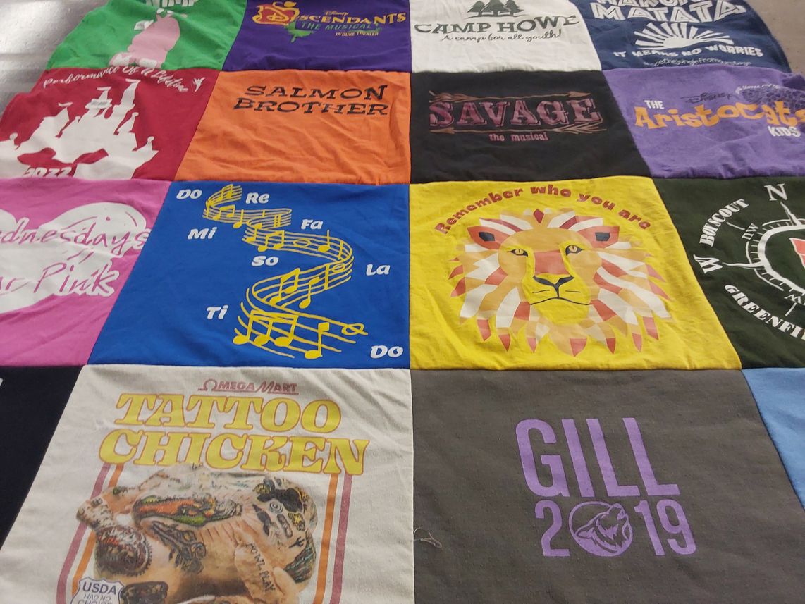 T-shirt quilt with theater, music themes by Anne from MA