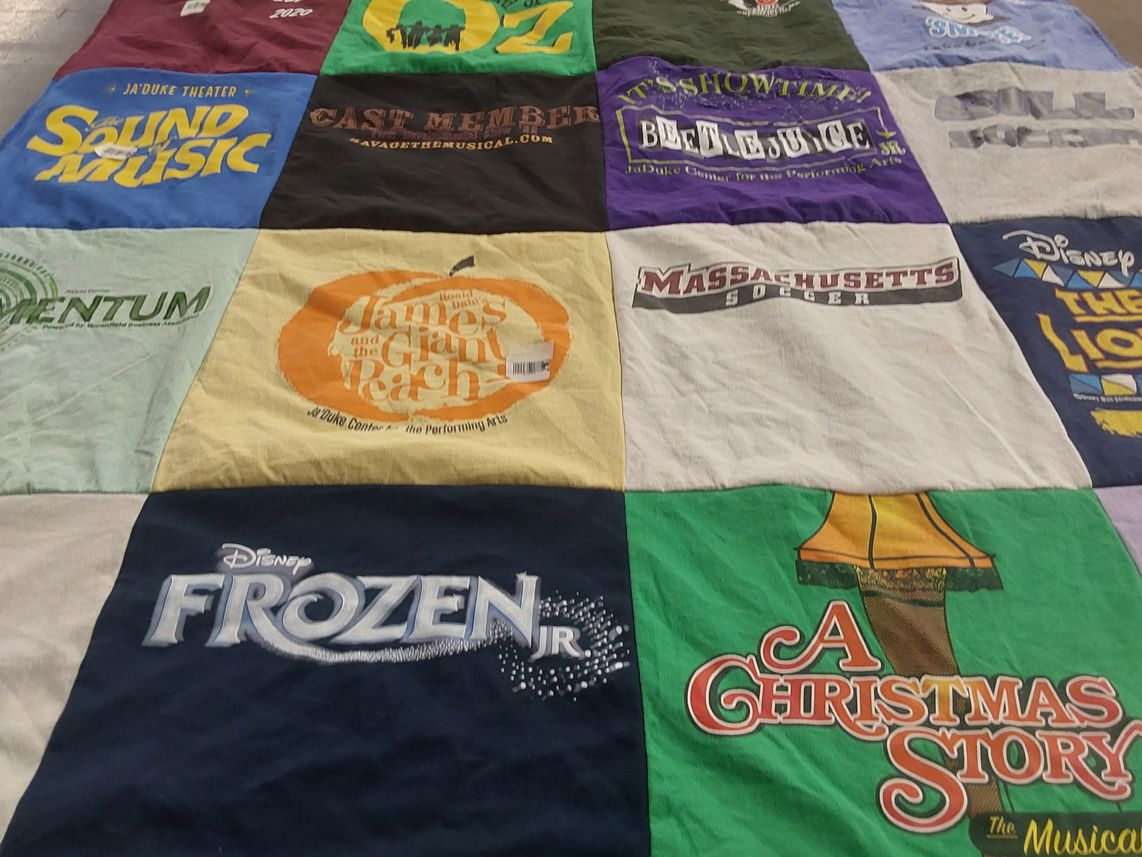 T-shirt quilt with musical theater, performing arts themes by Anne from MA