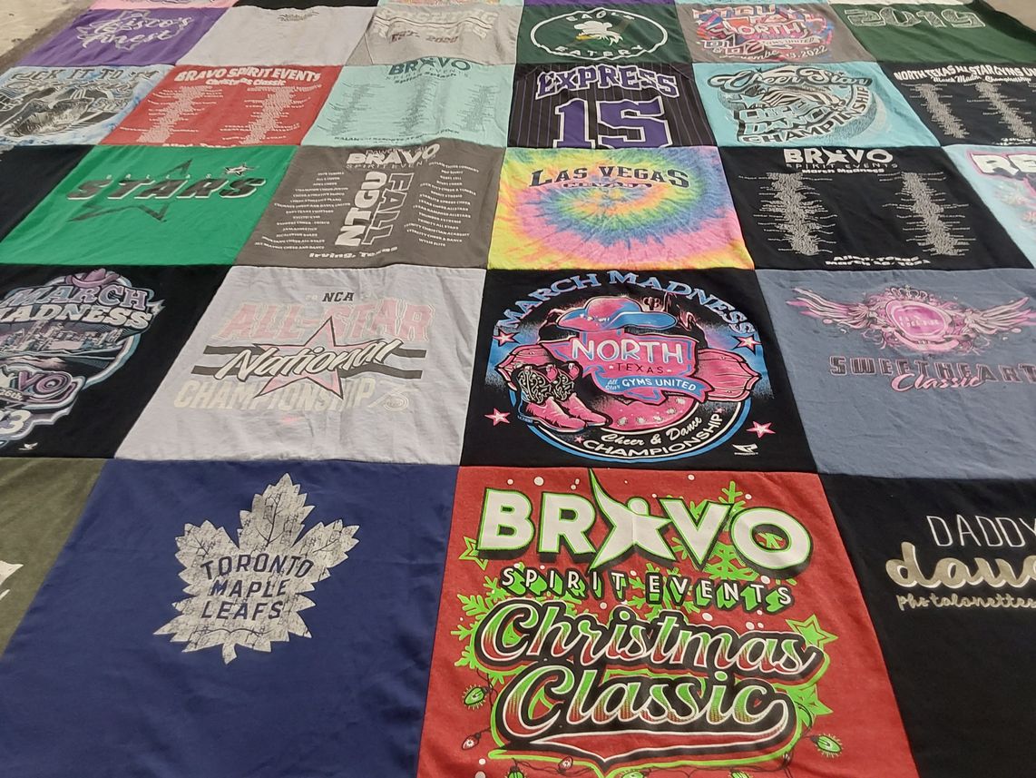 T-shirt quilt with cheer, dance themes by bobbie from TX