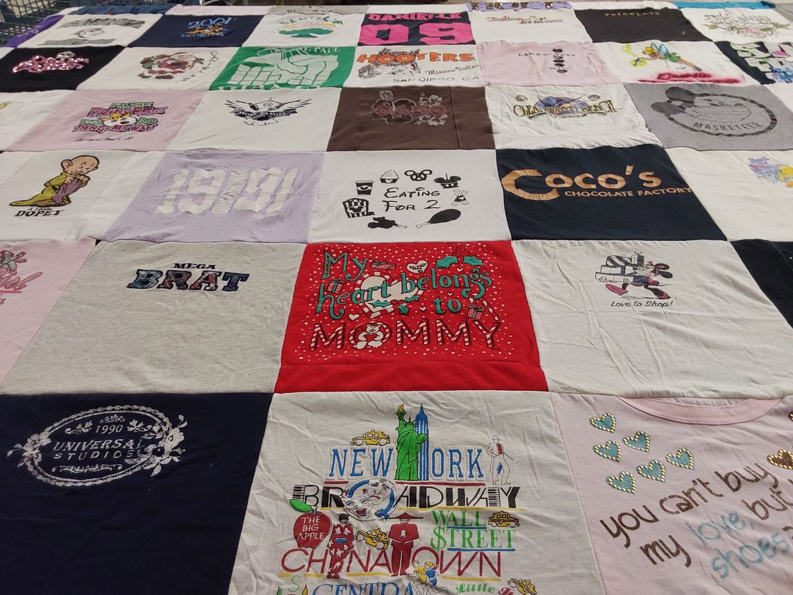 T-shirt quilt with theme parks, theatrical arts themes by Debbie from IL