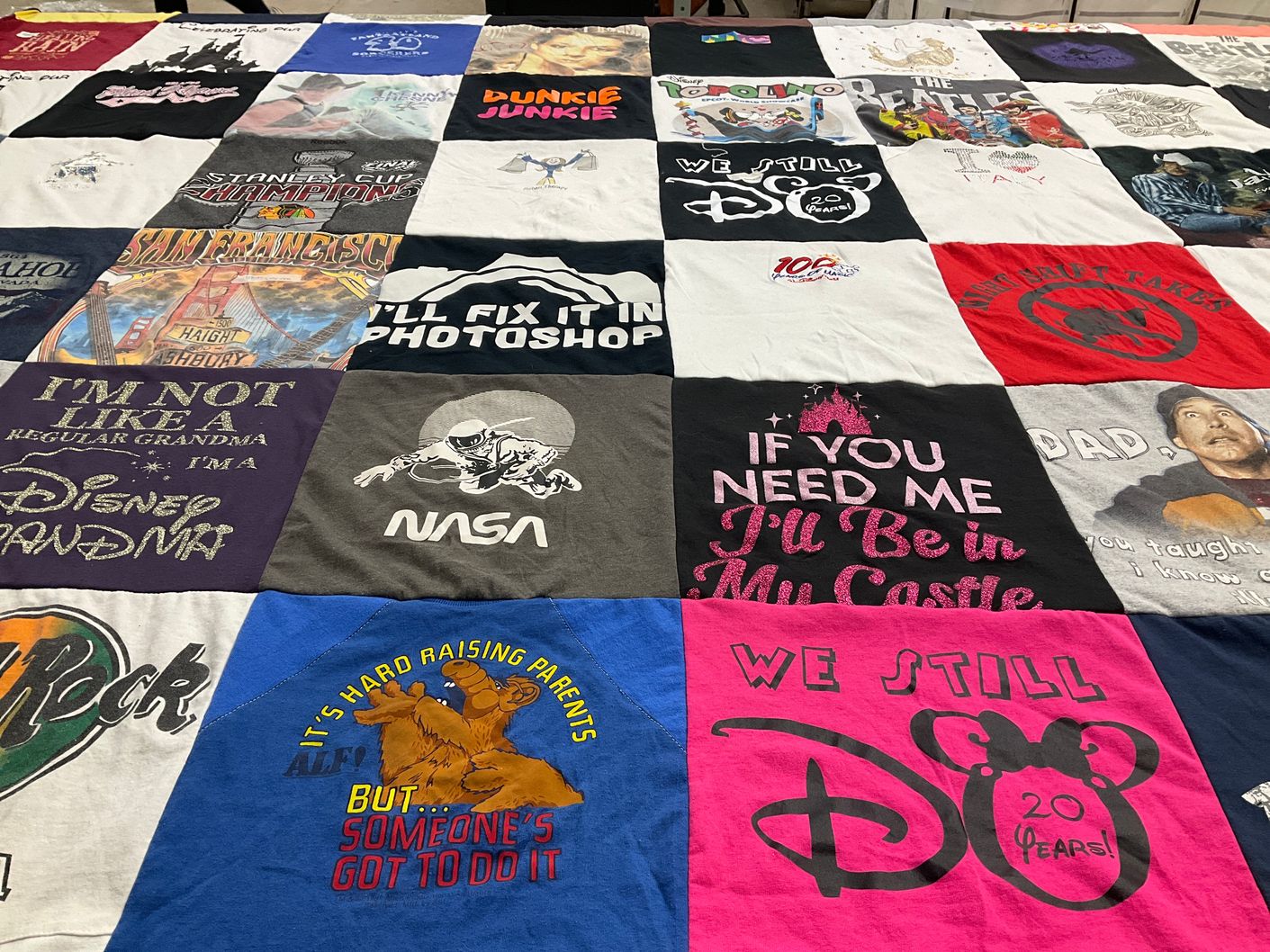 T-shirt quilt with disney, nasa themes by Debbie from IL