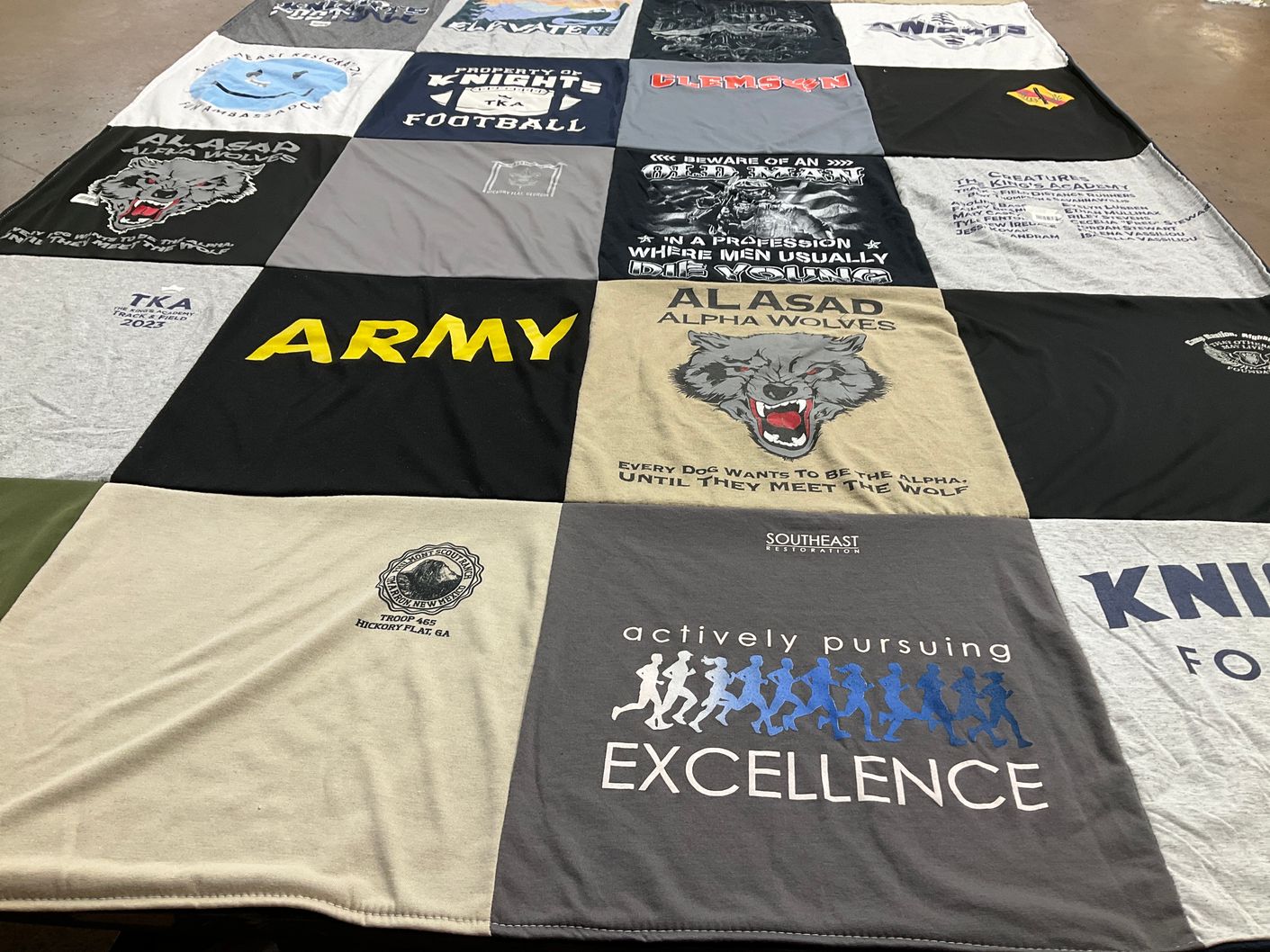 T-shirt quilt with military, education themes by Hope from GA