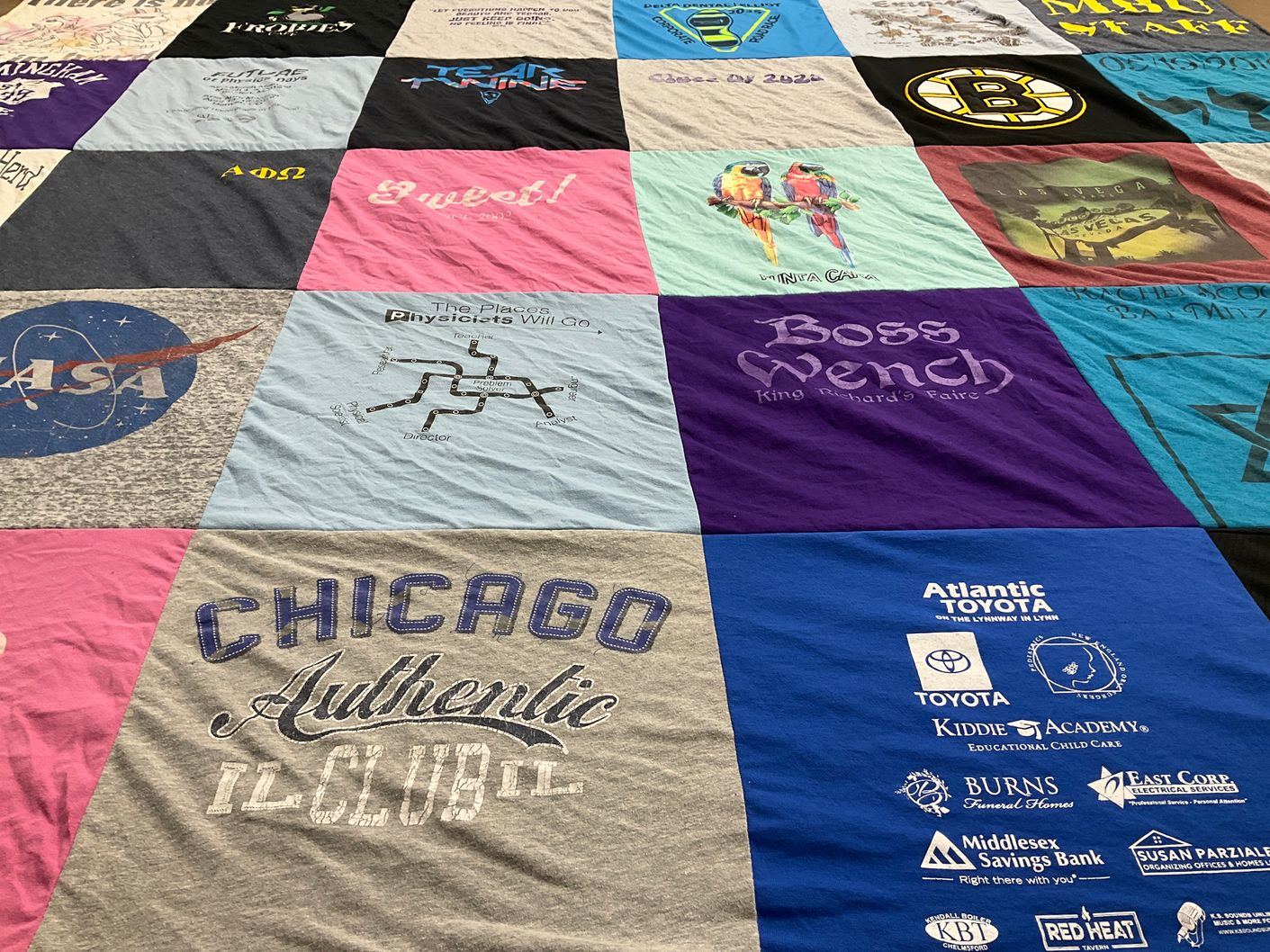 T-shirt quilt with physics, space themes by Jennifer from MA