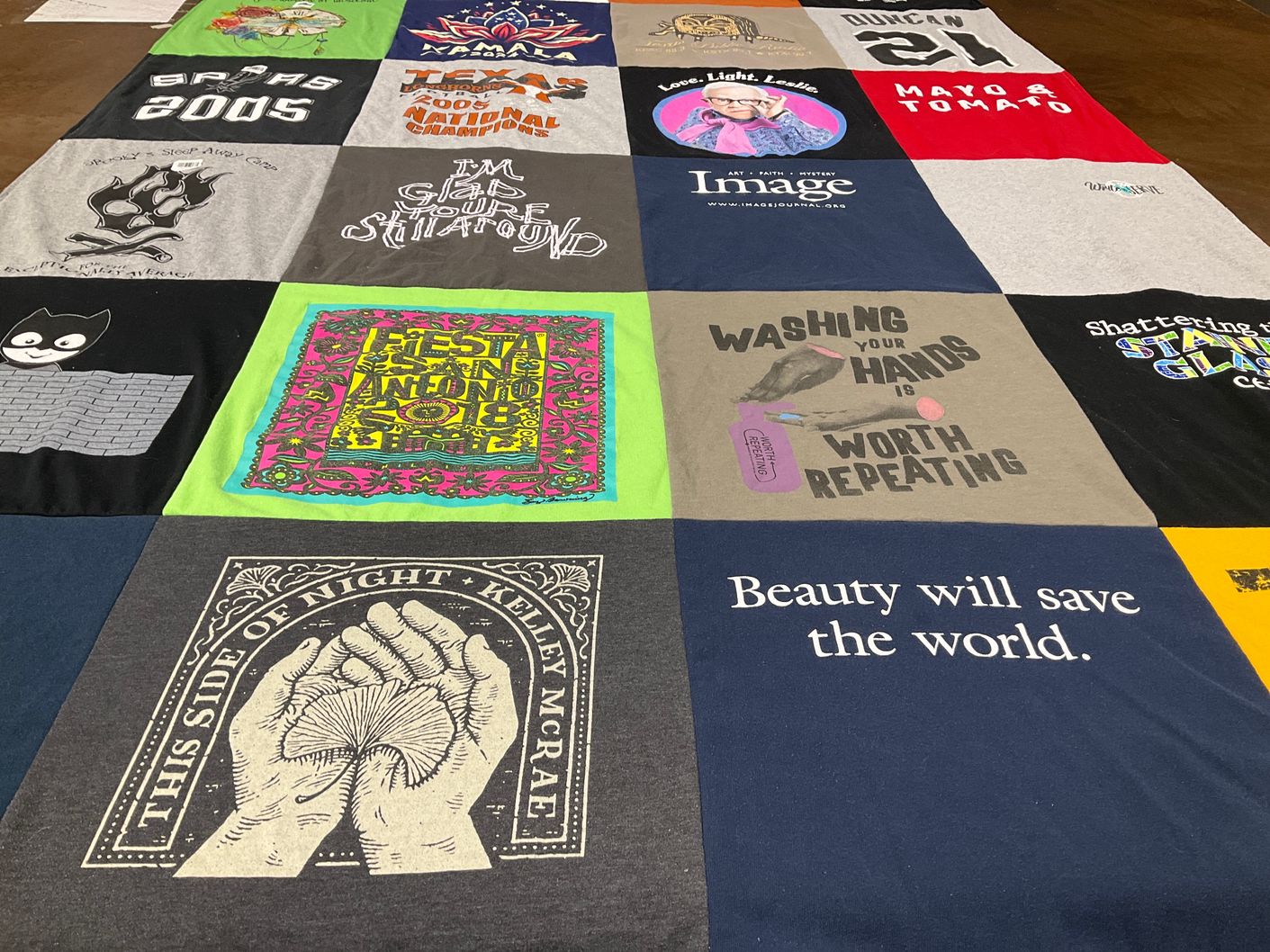 T-shirt quilt with music, art themes by Cynthia E from TX