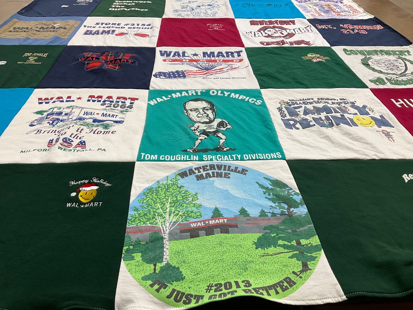 T-shirt quilt with shopping, community events themes by Kyler from AR