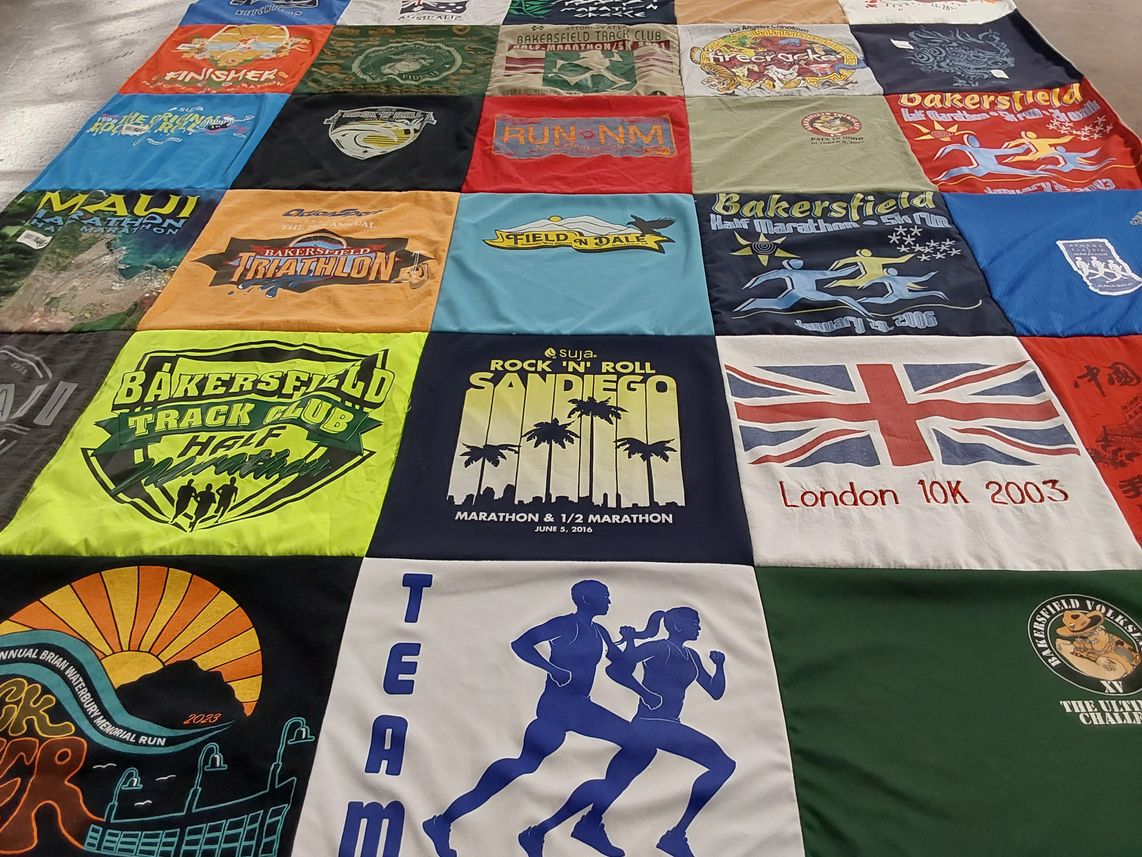 T-shirt quilt with running, marathons themes by Sharon from CA