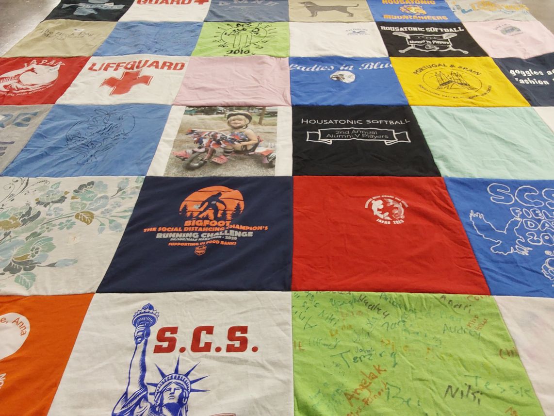 T-shirt quilt with sports, running themes by Christine from CT