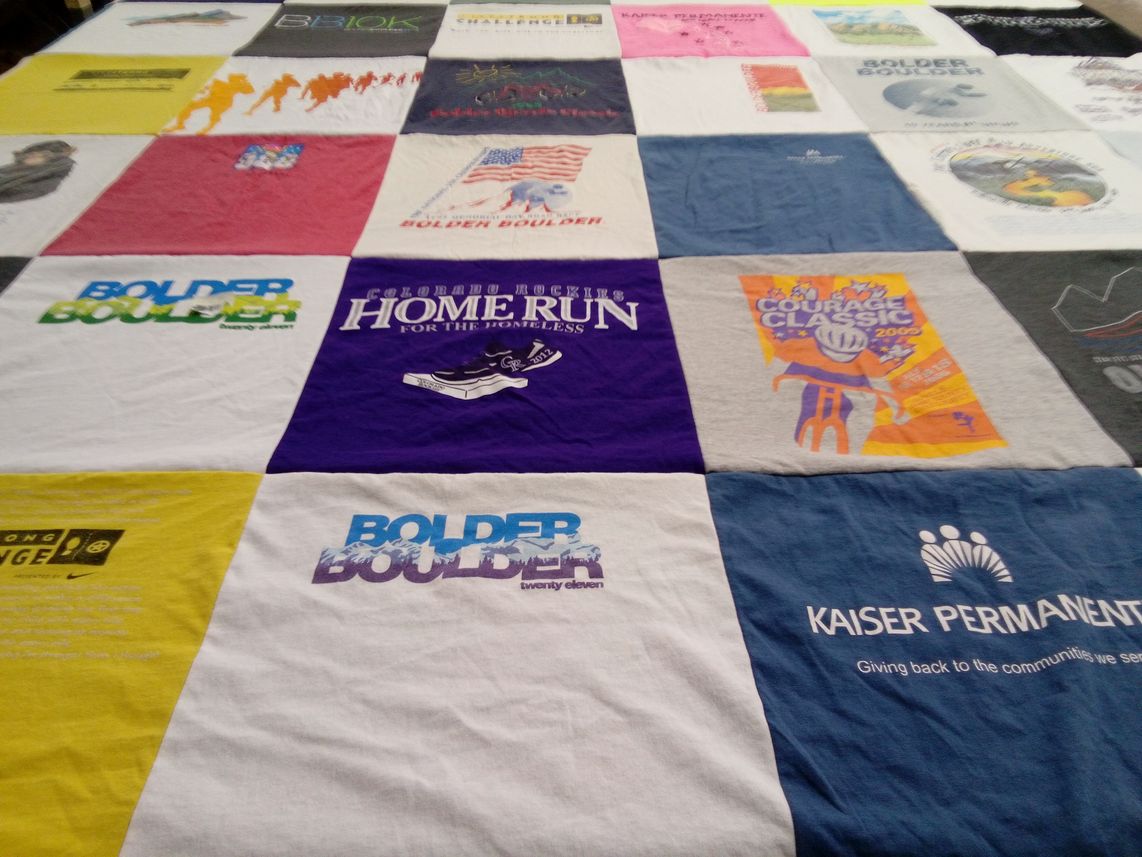 T-shirt quilt with running, community service themes by Kathleen from CO