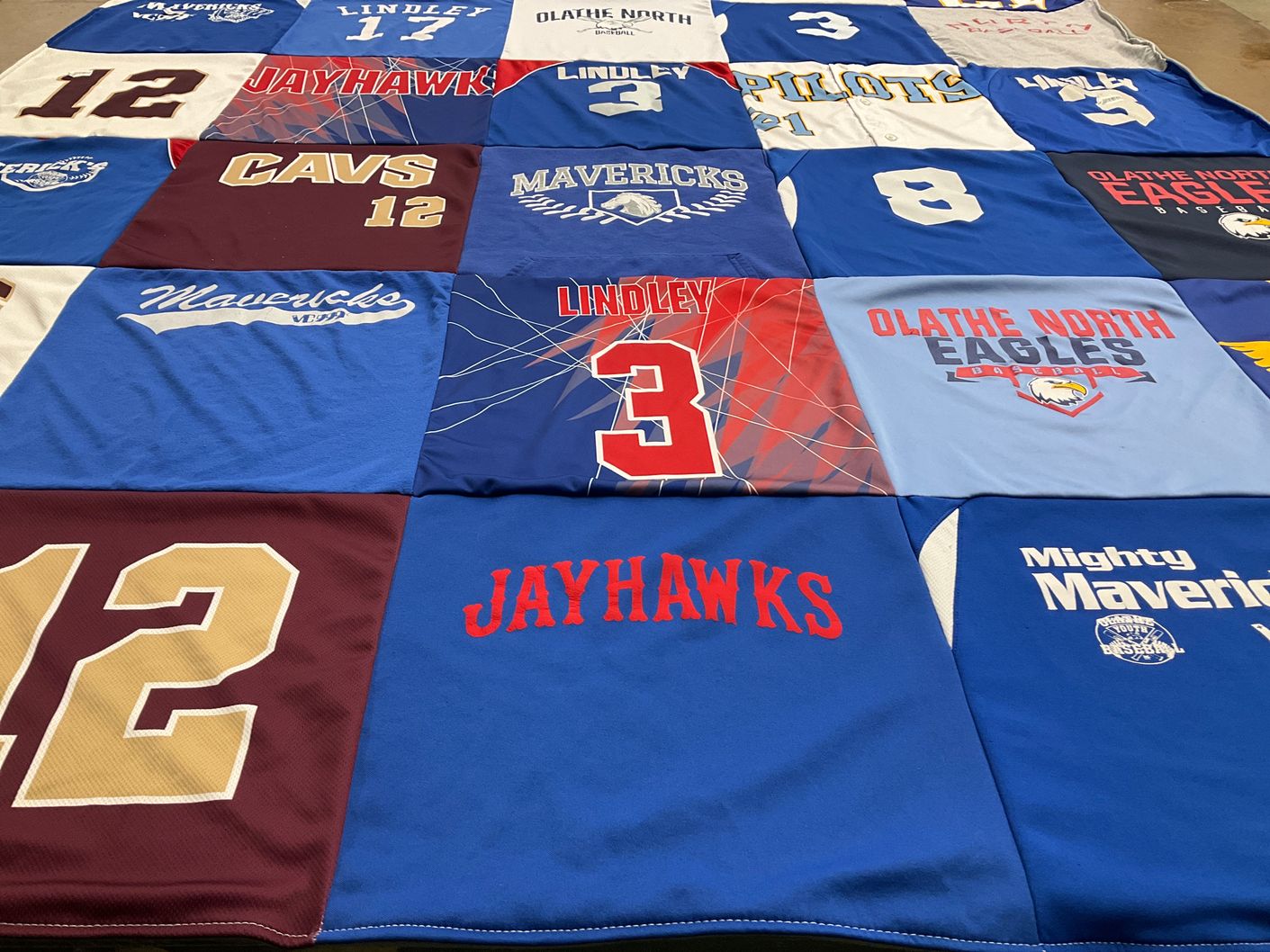 T-shirt quilt featuring mavericks, jayhawks by Carrie from KS