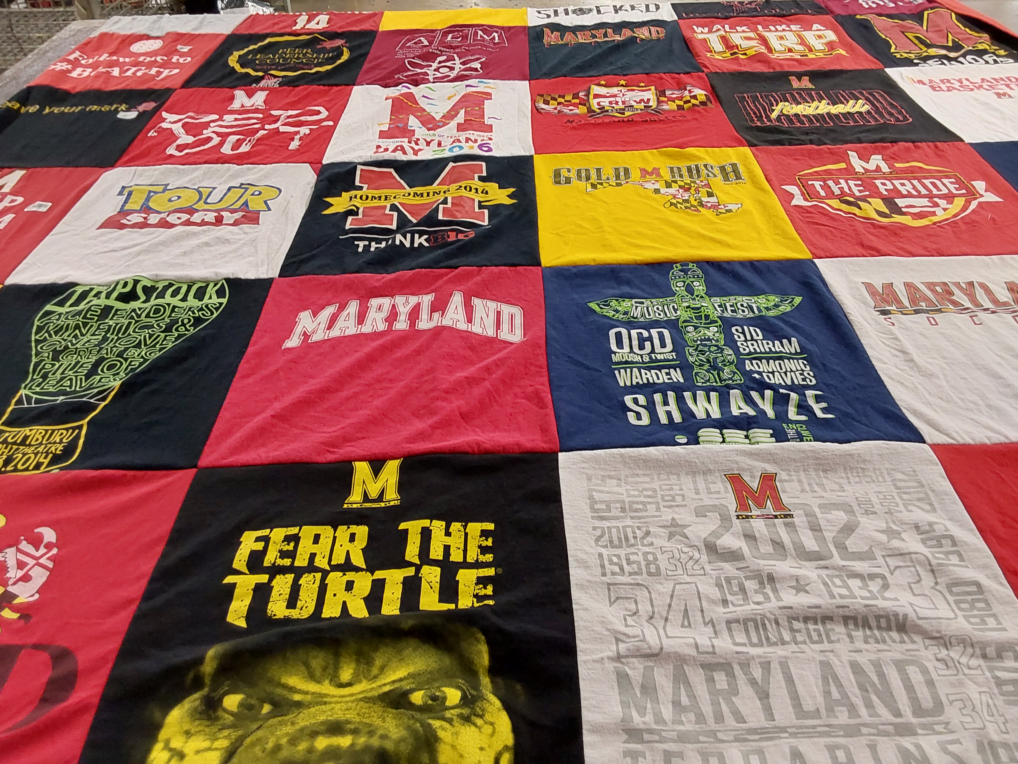T-shirt quilt with toys, playing themes by Brenda from MD