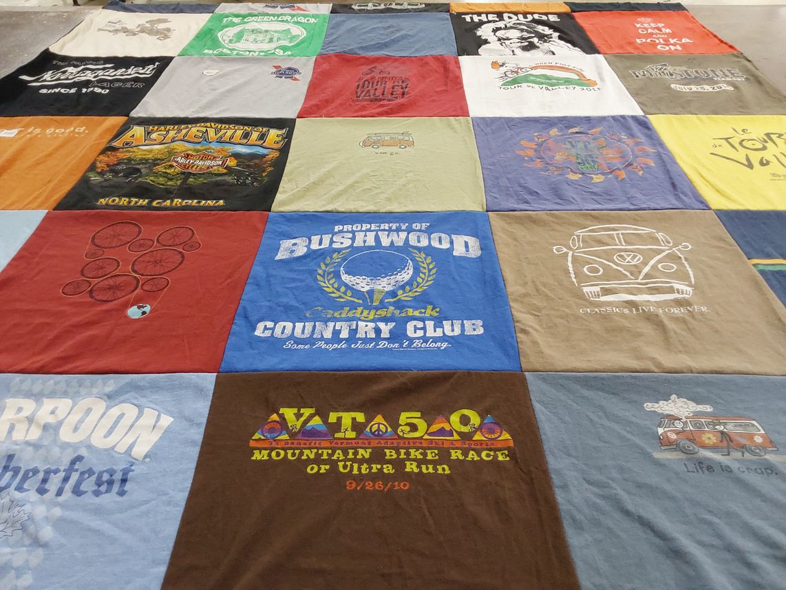 T-shirt quilt with cycling, biking themes by Monica from CT