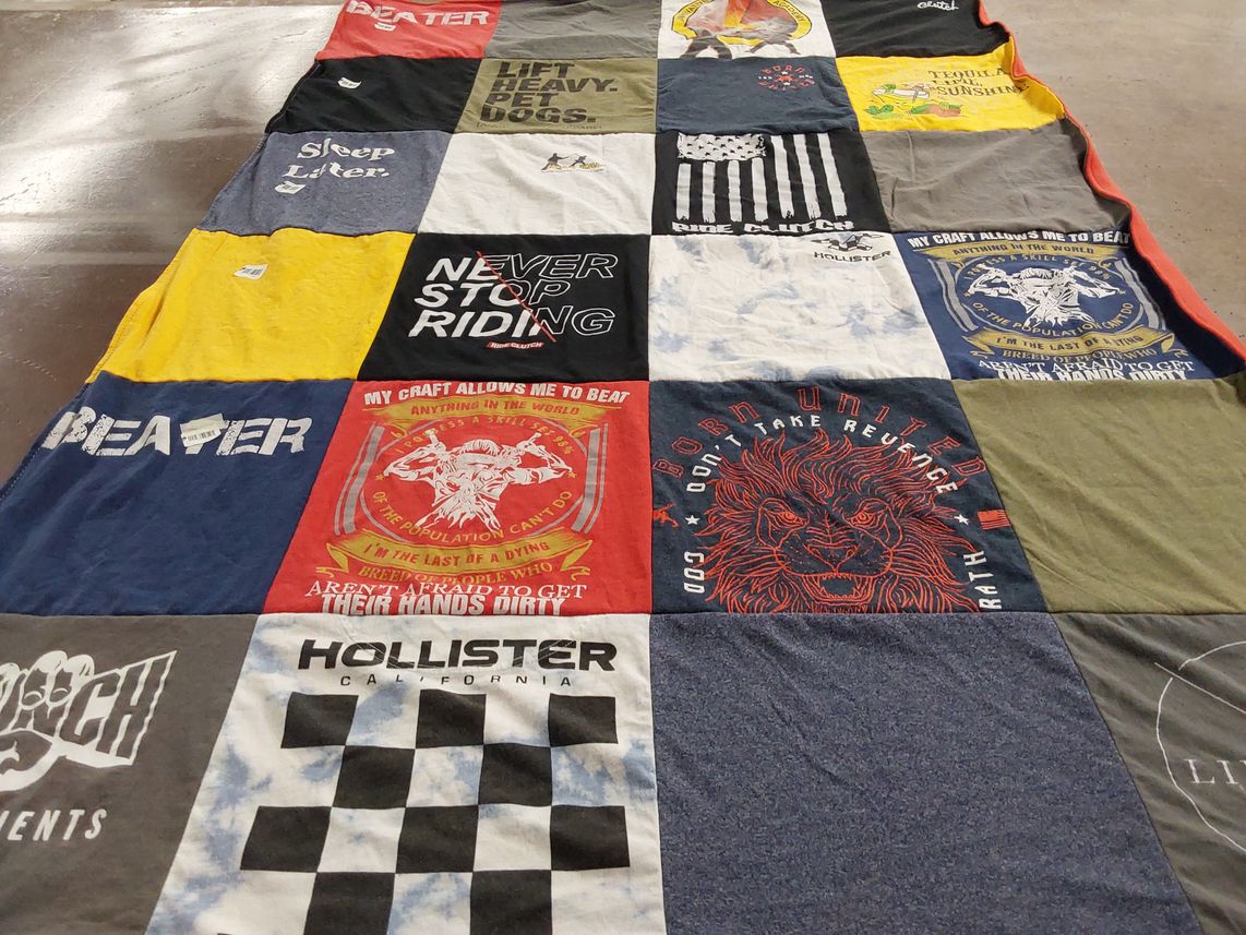 T-shirt quilt with fitness, outdoors themes by Mathew from NC