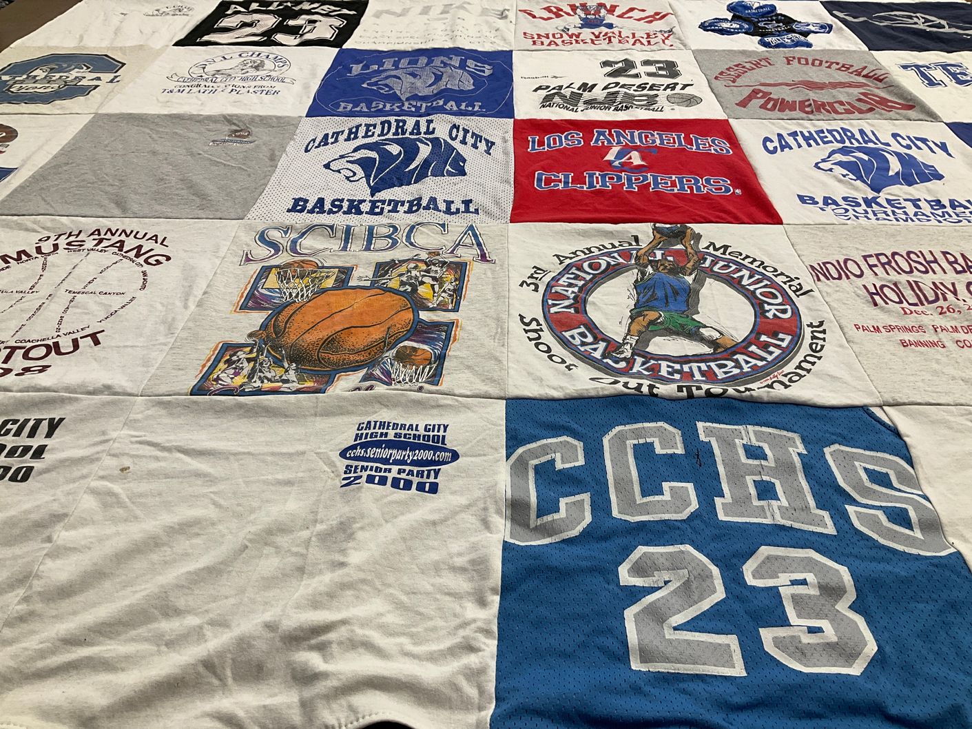 T-shirt quilt featuring los angeles clippers, cathedral city lions by Heather from CA