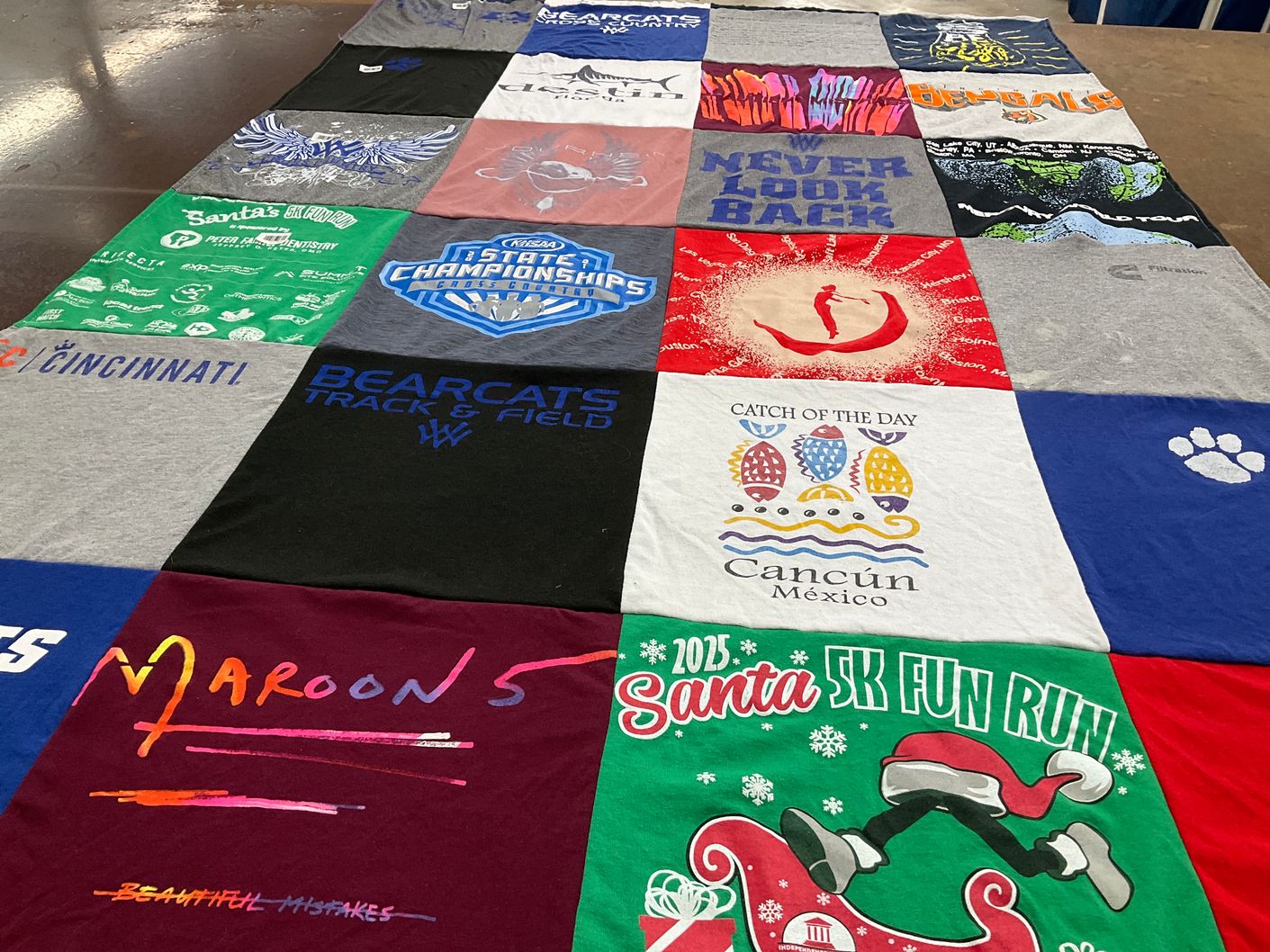 T-shirt quilt featuring university of cincinnati bearcats track and field, maroons by Susan from KY