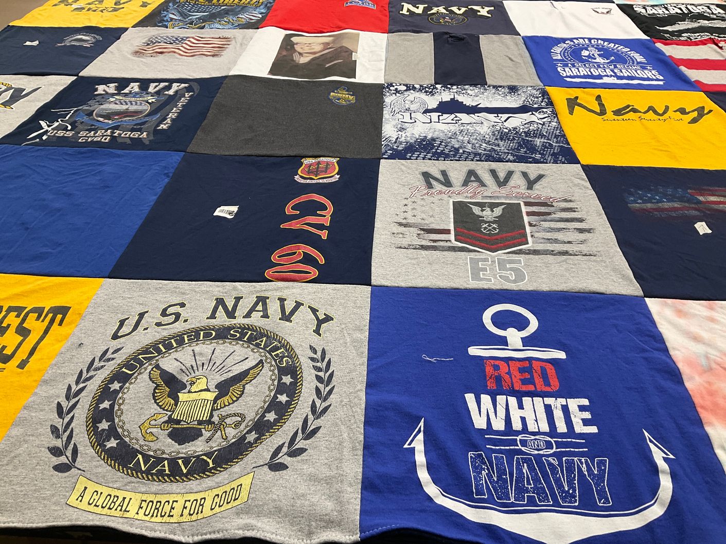 T-shirt quilt with military, navy themes by Nancy from MO