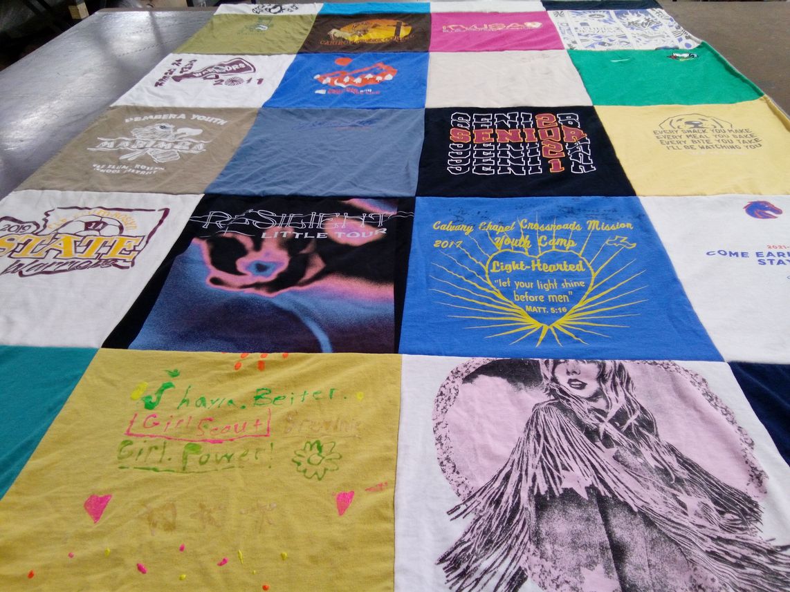 T-shirt quilt with youth camps, girl scouts themes by Amy from WA