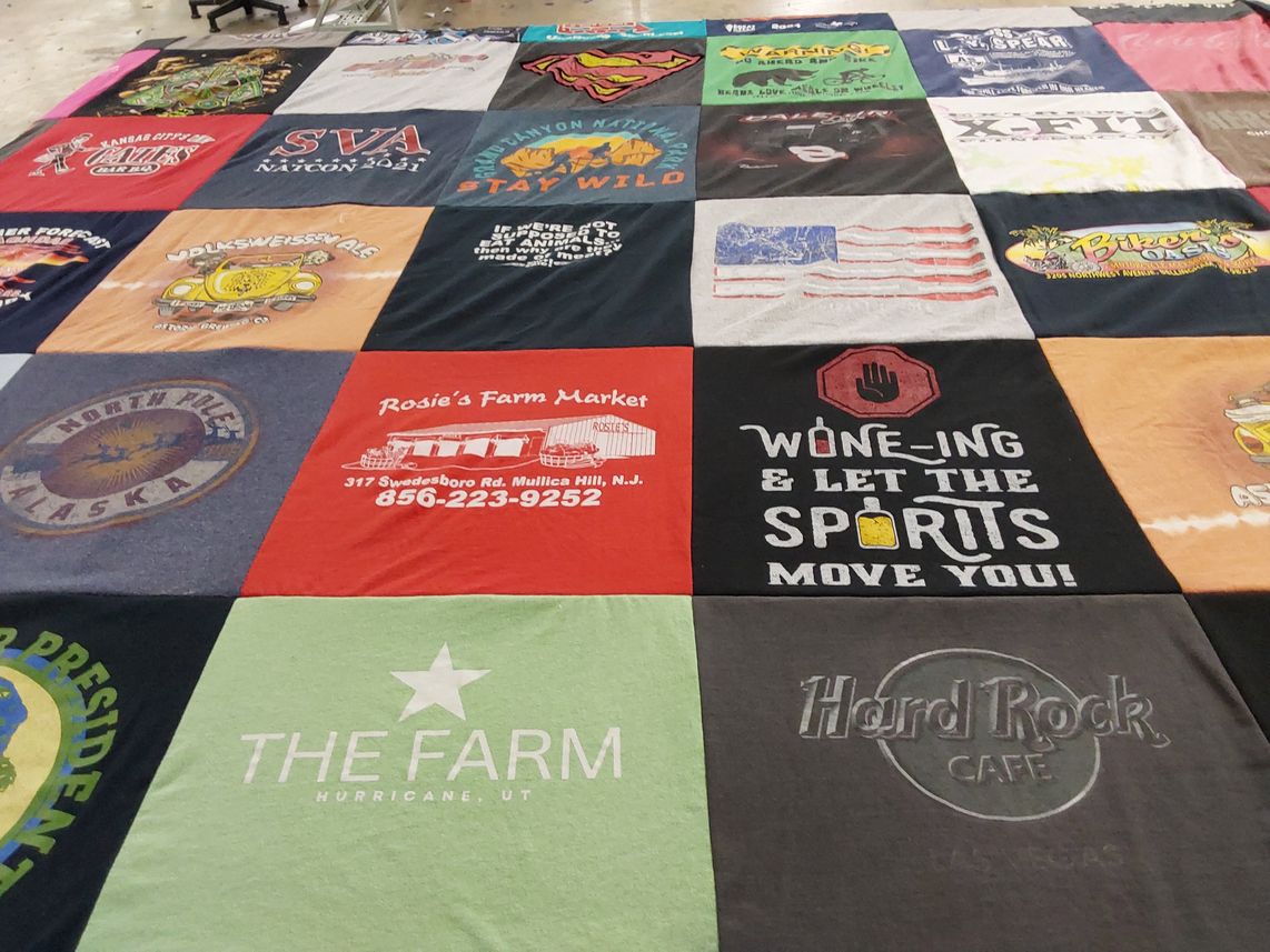 T-shirt quilt with wine, spirits themes by Dan from WA
