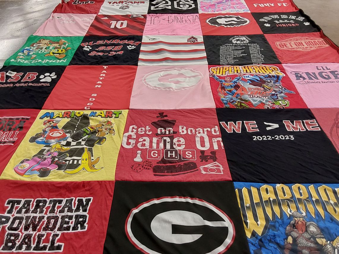 T-shirt quilt featuring tartan soccer team by Stacy from CA